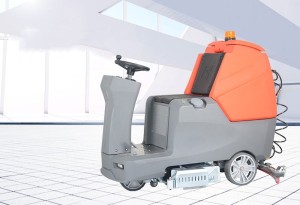 Driving floor cleaning machine